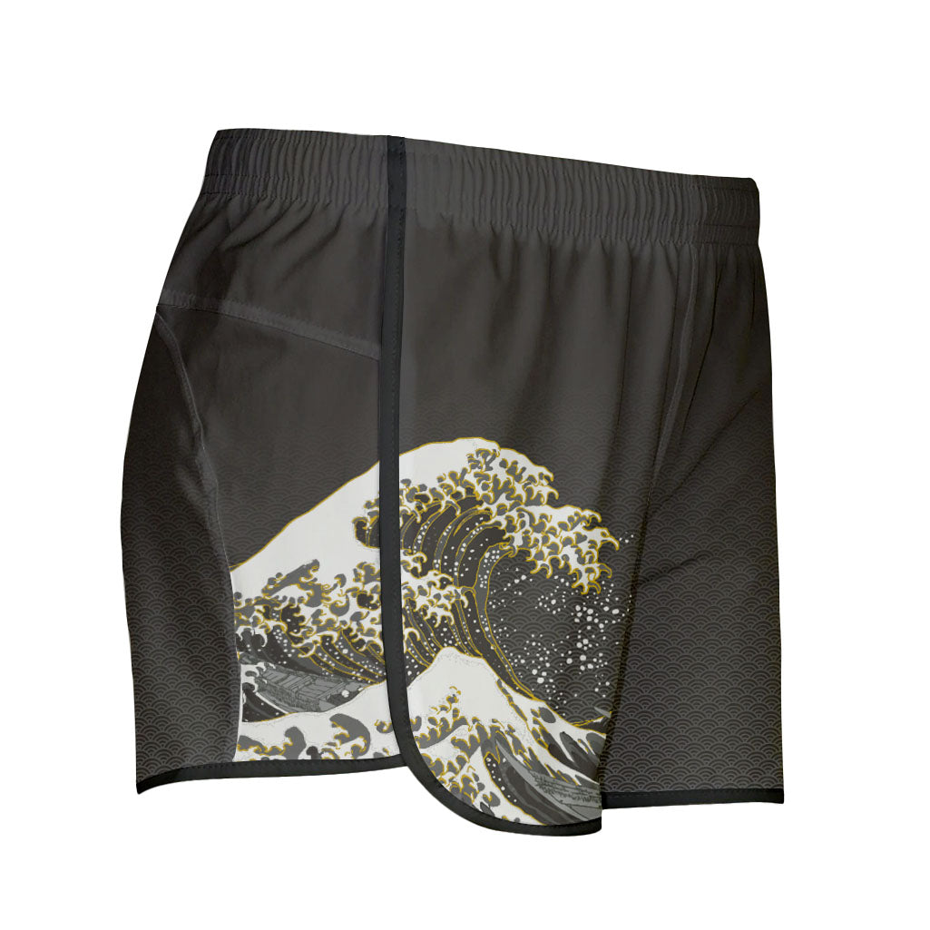 Black shorts with scale pattern featuring Hokusai's Great Wave on the right leg